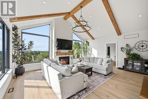 3041 Stu Black Road, Hamilton Township, ON - Indoor With Fireplace