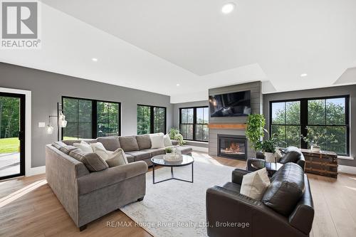3041 Stu Black Road, Hamilton Township, ON - Indoor Photo Showing Living Room With Fireplace