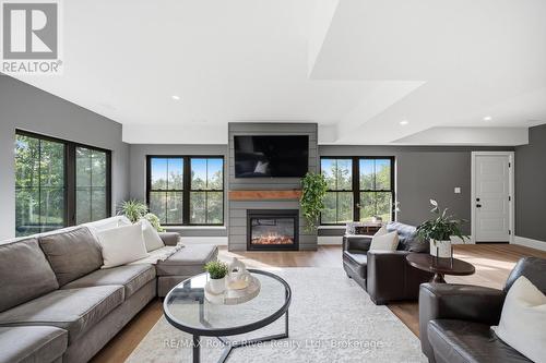 3041 Stu Black Road, Hamilton Township, ON - Indoor Photo Showing Living Room With Fireplace