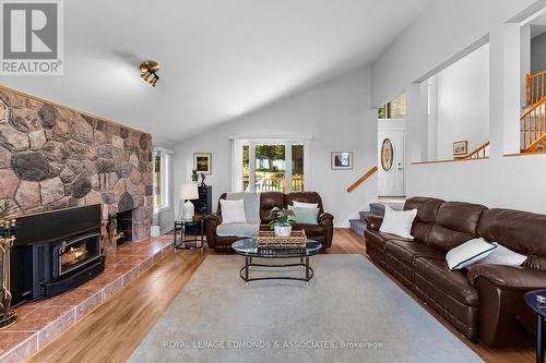 382 Greenway Drive, Whitewater Region, ON - Indoor Photo Showing Living Room With Fireplace