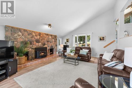 382 Greenway Drive, Whitewater Region, ON - Indoor Photo Showing Living Room With Fireplace