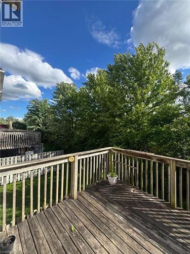 Expansive wood deck with full baluster railing and privacy fencing - 151 Clairfields Drive E Unit# 39, Guelph, ON - Outdoor