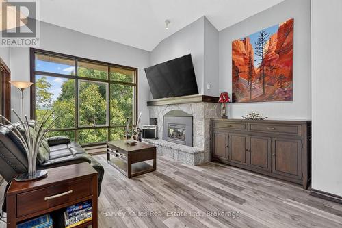 303 - 26 Deerhurst Golfview Drive, Huntsville (Chaffey), ON - Indoor Photo Showing Other Room With Fireplace