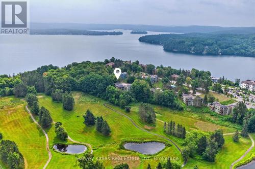 303 - 26 Deerhurst Golfview Drive, Huntsville (Chaffey), ON - Outdoor With Body Of Water With View