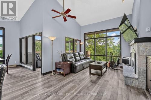 Living room with private views - 303 - 26 Deerhurst Golfview Drive, Huntsville (Chaffey), ON - Indoor Photo Showing Other Room