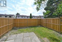 Fenced-in yard with patio - 