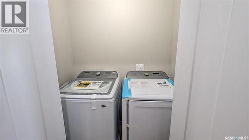 23 101 Neis Access Road, Emma Lake, SK - Indoor Photo Showing Laundry Room