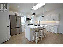 Expanded and upgraded kitchen with skylight - 