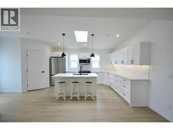 Expanded and upgraded kitchen with skylight - 