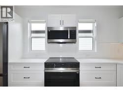 Expanded and upgraded kitchen with skylight - 