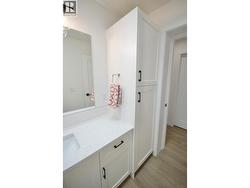 Main Bathroom with tile tub surround and quartz counters - 