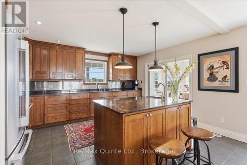 Main Home - Kitchen with Island and sunroom - 249 Carter Road, Prince Edward County (Hillier Ward), ON 