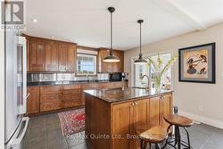 Main Home - Kitchen with Island and sunroom - 