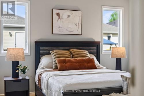2030 Swanfield Street, Kingston (East Gardiners Rd), ON - Indoor Photo Showing Bedroom With Fireplace