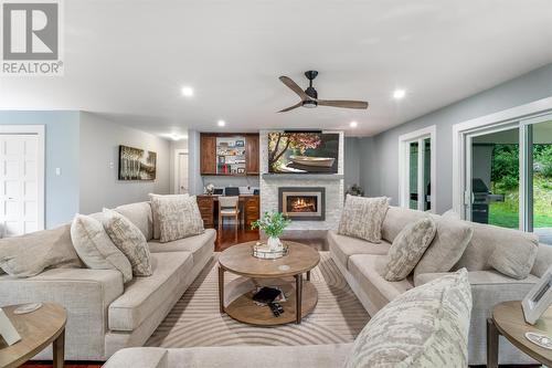 226-228 Main Road, North River, NL - Indoor Photo Showing Living Room With Fireplace