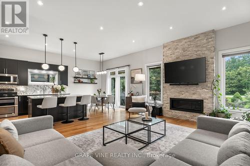 1592 Rosebella Avenue, Ottawa, ON - Indoor Photo Showing Living Room With Fireplace