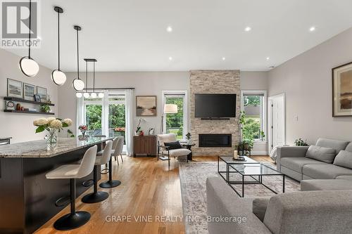 1592 Rosebella Avenue, Ottawa, ON - Indoor Photo Showing Living Room With Fireplace