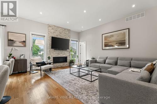 1592 Rosebella Avenue, Ottawa, ON - Indoor Photo Showing Living Room With Fireplace