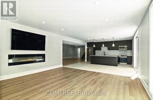 135 Cherryhill Drive, Ottawa, ON - Indoor Photo Showing Other Room With Fireplace