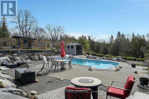 Backyard - 3968 Elphin Maberly Road, Frontenac (Frontenac North), ON - Outdoor With In Ground Pool With Deck Patio Veranda