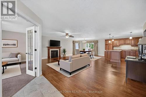 Virtually Staged - 1124 Mcclure Crescent, Brockville, ON - Indoor Photo Showing Living Room With Fireplace
