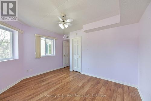 With walk-in closet - Unit 201 - 115 Bond Street, Orillia, ON - Indoor Photo Showing Other Room