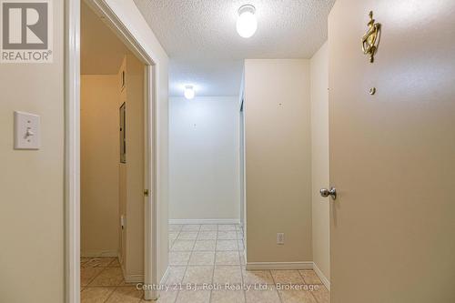 Close to elevator and stairs - Unit 201 - 115 Bond Street, Orillia, ON - Indoor Photo Showing Other Room