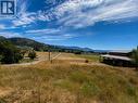 View from top of property looking towards the street. - 528 Snowsell Street N, Kelowna, BC 