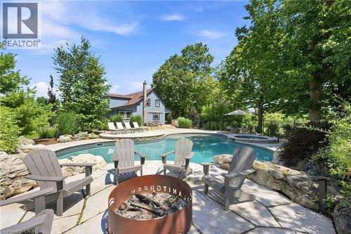 62 Thompson Road, Brantford, ON - Outdoor With In Ground Pool