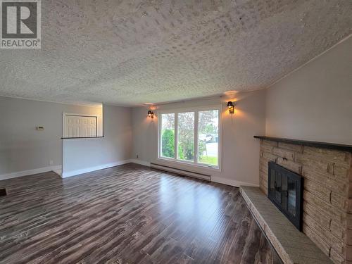 52 Coronation Street, Corner Brook, NL - Indoor Photo Showing Living Room With Fireplace