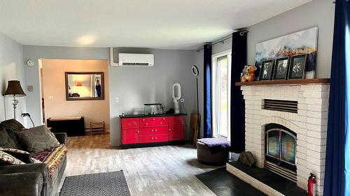 225 6Th Street, Nakusp, BC - Indoor Photo Showing Other Room With Fireplace