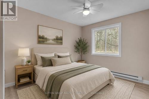 Virtually Staged detached 1 bedroom house - 1140 St. Georges Lake Road, Frontenac (Frontenac Centre), ON - Indoor Photo Showing Bedroom