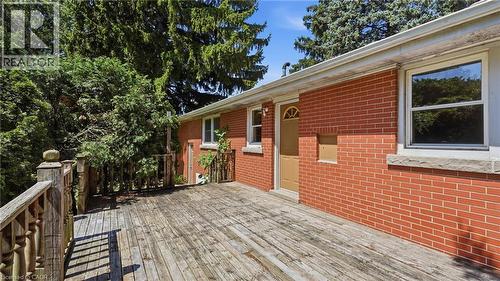 Expansive wood deck with a full railing system - 524 Dorval Drive, Ancaster, ON - Outdoor With Exterior