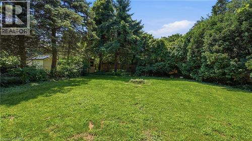Expansive green space featuring a garden bed - 524 Dorval Drive, Ancaster, ON - Outdoor