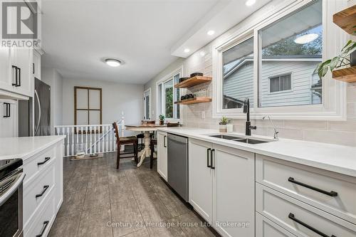 653 Perry Street, Centre Wellington (Fergus), ON - Indoor Photo Showing Kitchen With Double Sink