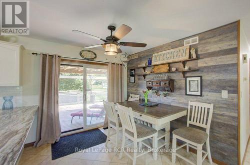 Sliding door to  covered deck - 7195 Sixteenth Line, Mapleton, ON 