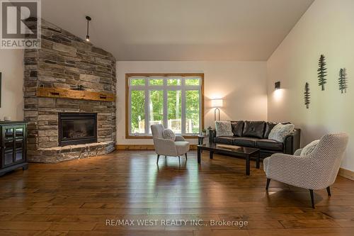 215 Flatrock Road, Tweed, ON - Indoor Photo Showing Living Room With Fireplace