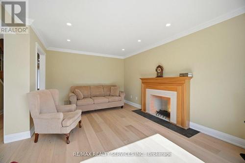 23 Newbury Crescent, Brampton, ON - Indoor Photo Showing Living Room With Fireplace