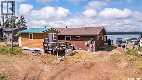 128 Jacobson Drive, Lakeland Rm No. 521, SK - Outdoor With Body Of Water With Deck Patio Veranda