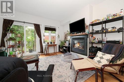 Living Room - 3 - 795 Montreal Road, Ottawa, ON - Indoor Photo Showing Living Room With Fireplace