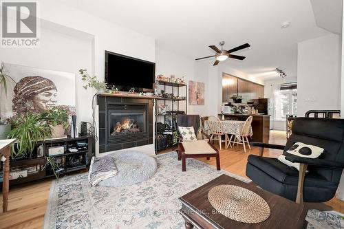Living /Dining Room/Kitchen - 3 - 795 Montreal Road, Ottawa, ON - Indoor Photo Showing Living Room With Fireplace