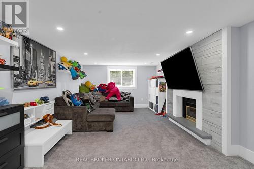 975 Sunnidale Road, Springwater, ON - Indoor Photo Showing Living Room With Fireplace