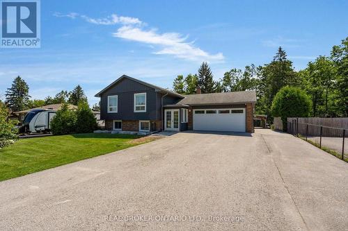975 Sunnidale Road, Springwater, ON - Outdoor With Facade