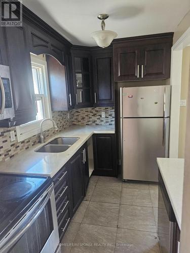 6 Gold Finch Court, Brampton, ON - Indoor Photo Showing Kitchen With Double Sink
