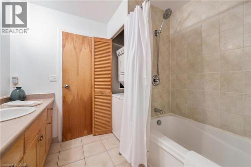 Laundry located in the closet in the bathroom. - 26 Ontario Street Unit# 127, Guelph, ON - Indoor Photo Showing Bathroom