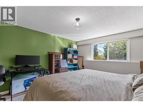 40 Ridgemont Avenue Unit# 101, Fernie, BC - Indoor Photo Showing Bedroom