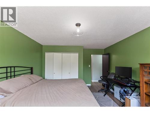 40 Ridgemont Avenue Unit# 101, Fernie, BC - Indoor Photo Showing Bedroom