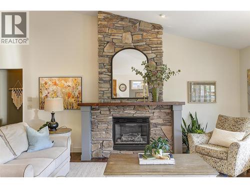 12931 East Ridge Drive, Lake Country, BC - Indoor Photo Showing Living Room With Fireplace