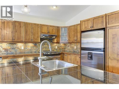 12931 East Ridge Drive, Lake Country, BC - Indoor Photo Showing Kitchen With Double Sink
