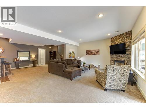 12931 East Ridge Drive, Lake Country, BC - Indoor Photo Showing Living Room With Fireplace
